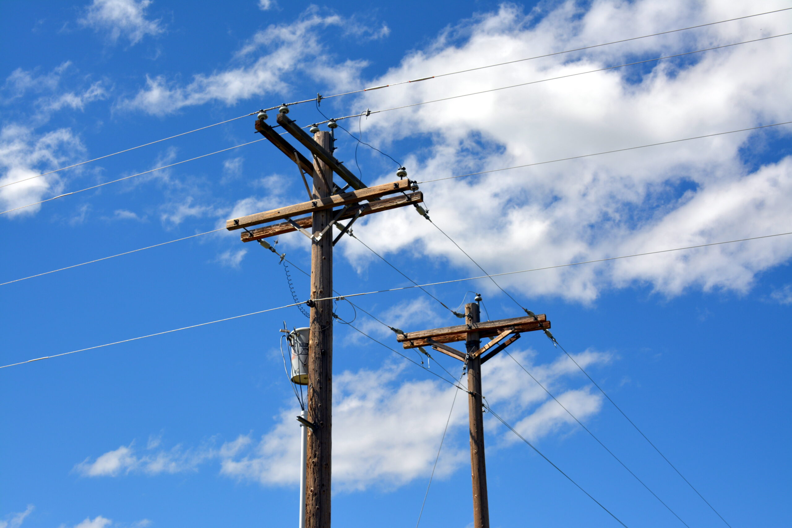 electric-poles-against-sky