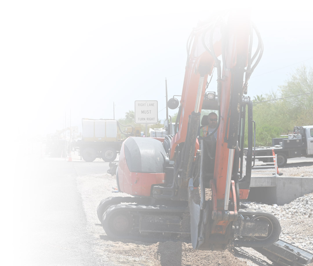 Excavator Working on Roadside Fiber Rollout